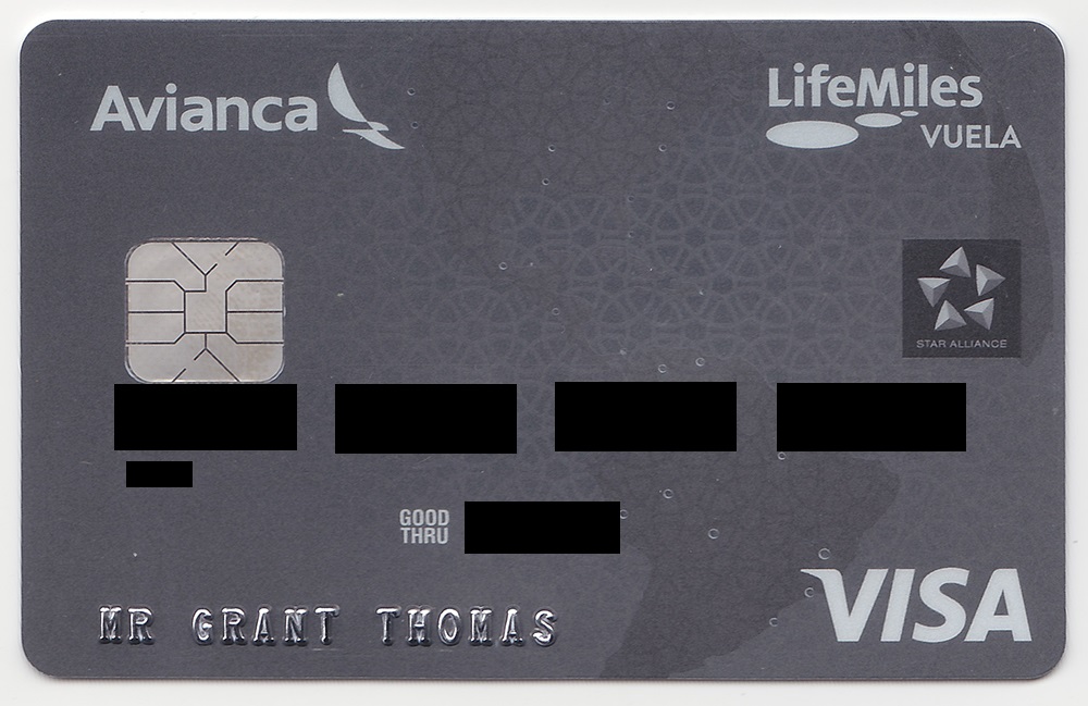 Image of the front of an Avianca LifeMiles Vuela Visa card with "Mr Grant Thomas" on the front. The numbers have been blacked out.
