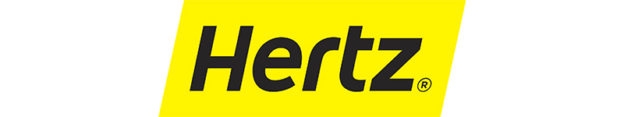a yellow sign with black letters