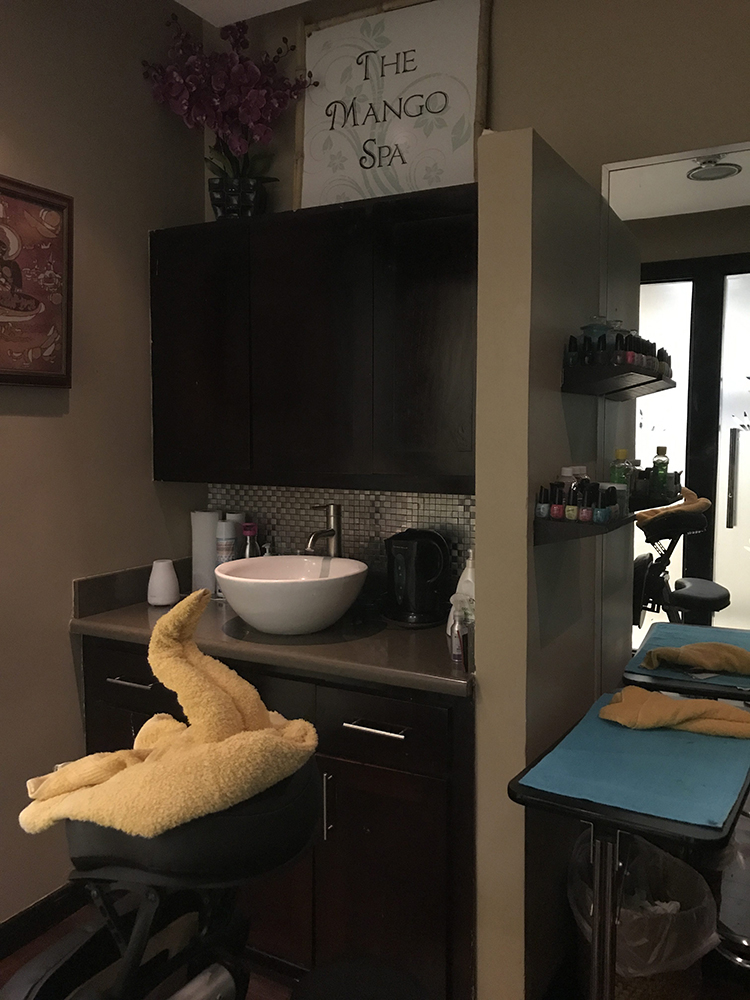 a bathroom with a sink and a towel