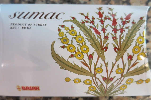 a white card with a floral design on it