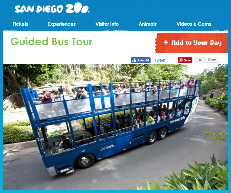 a blue double decker bus with people on it