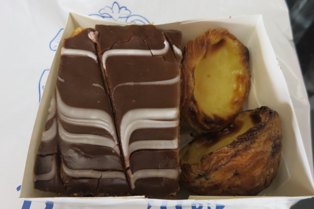 a box of pastries and a piece of cake