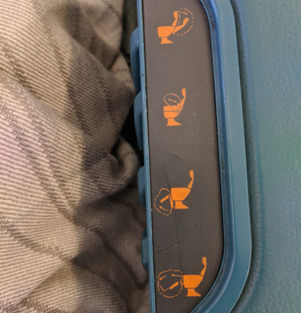 a seat button with a seat cover