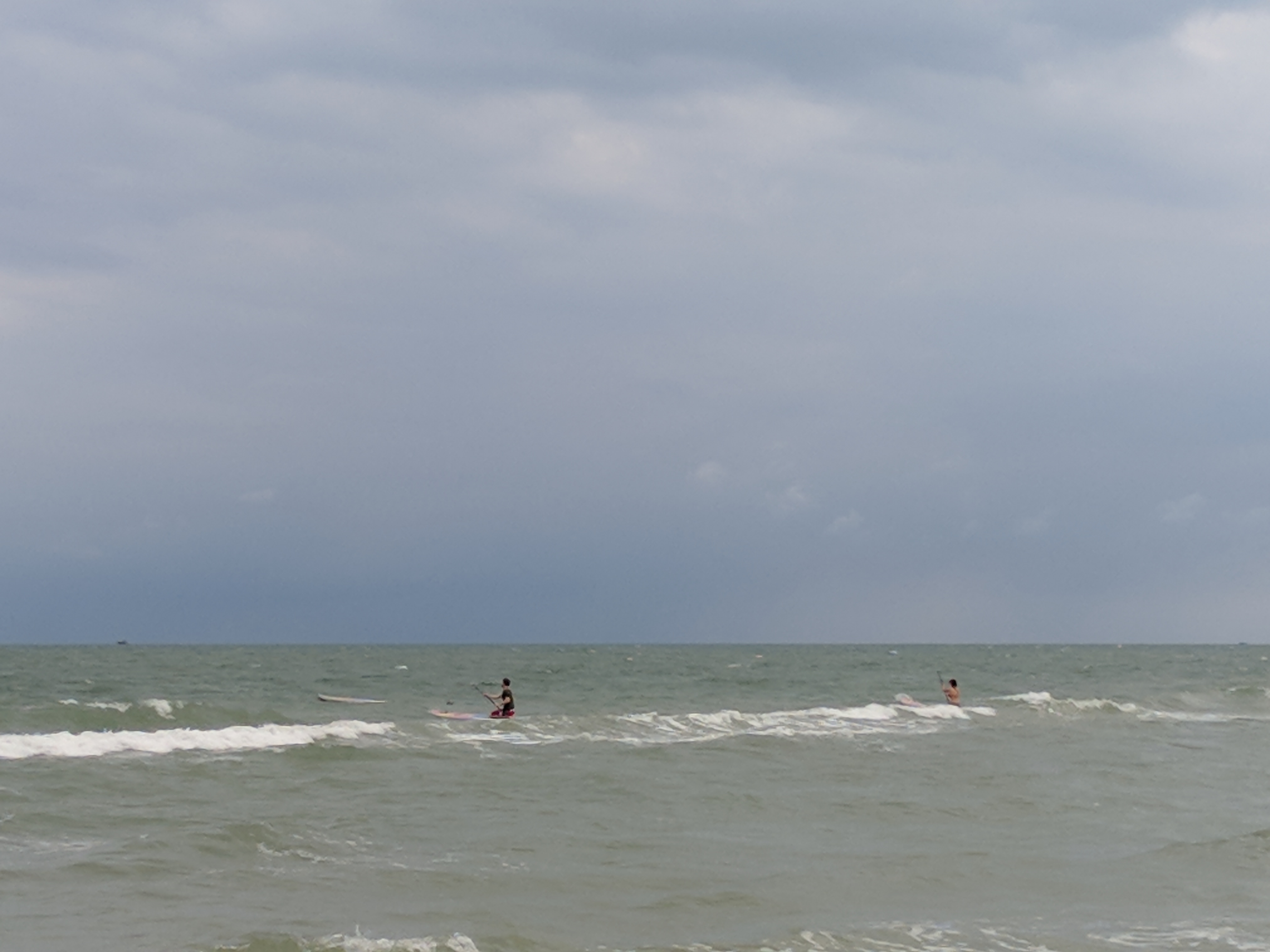 people surfing in the ocean